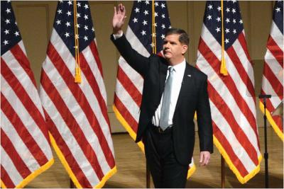 Mayor Martin J. Walsh waved to his audience at Symphony Hall during his State of the City speech on Tuesday evening. 	Chris Lovett photo